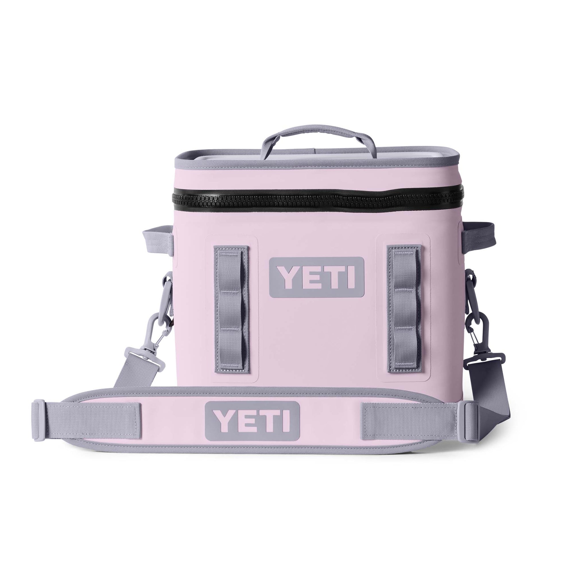 Front view of the YETI Hopper Flip 12 Cooler in Cherry Blossom with adjustable shoulder strap and two vertical gear loops.