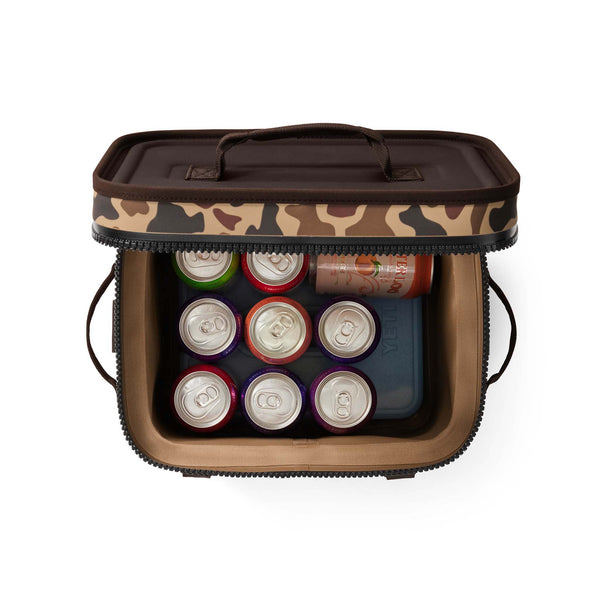 Top-down view showing 9 cans inside Hopper Flip 12 cooler with ice packs.