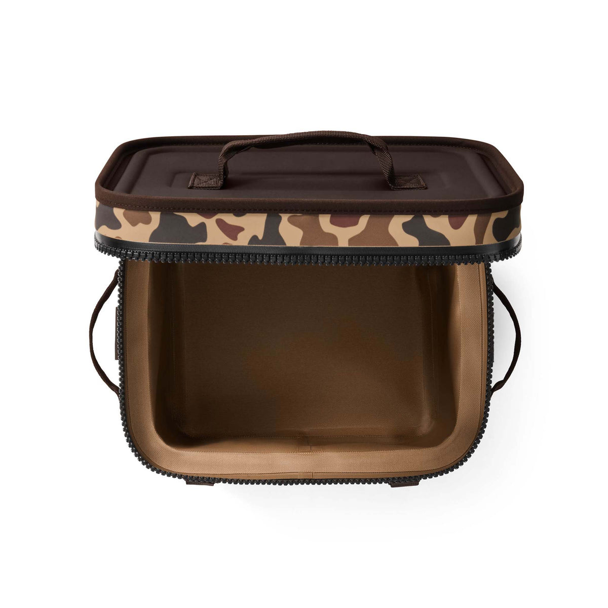 Top-down view of empty interior with tan lining and wide opening.