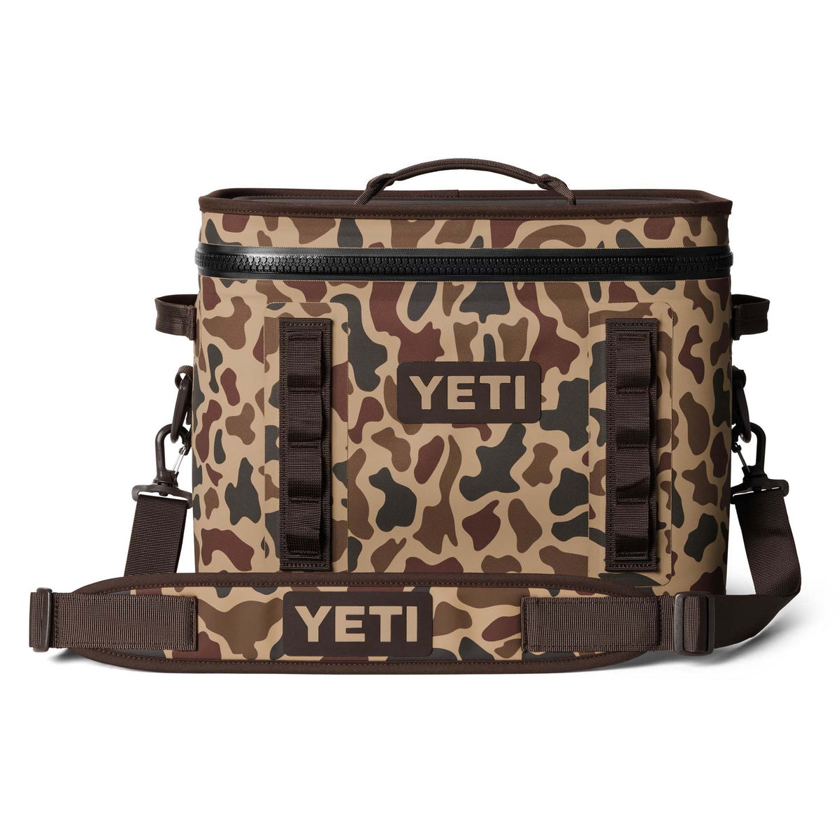 YETI Hopper Flip 18 soft cooler in Wetlands Camo shown at a front angle with the lid closed and side strap visible.