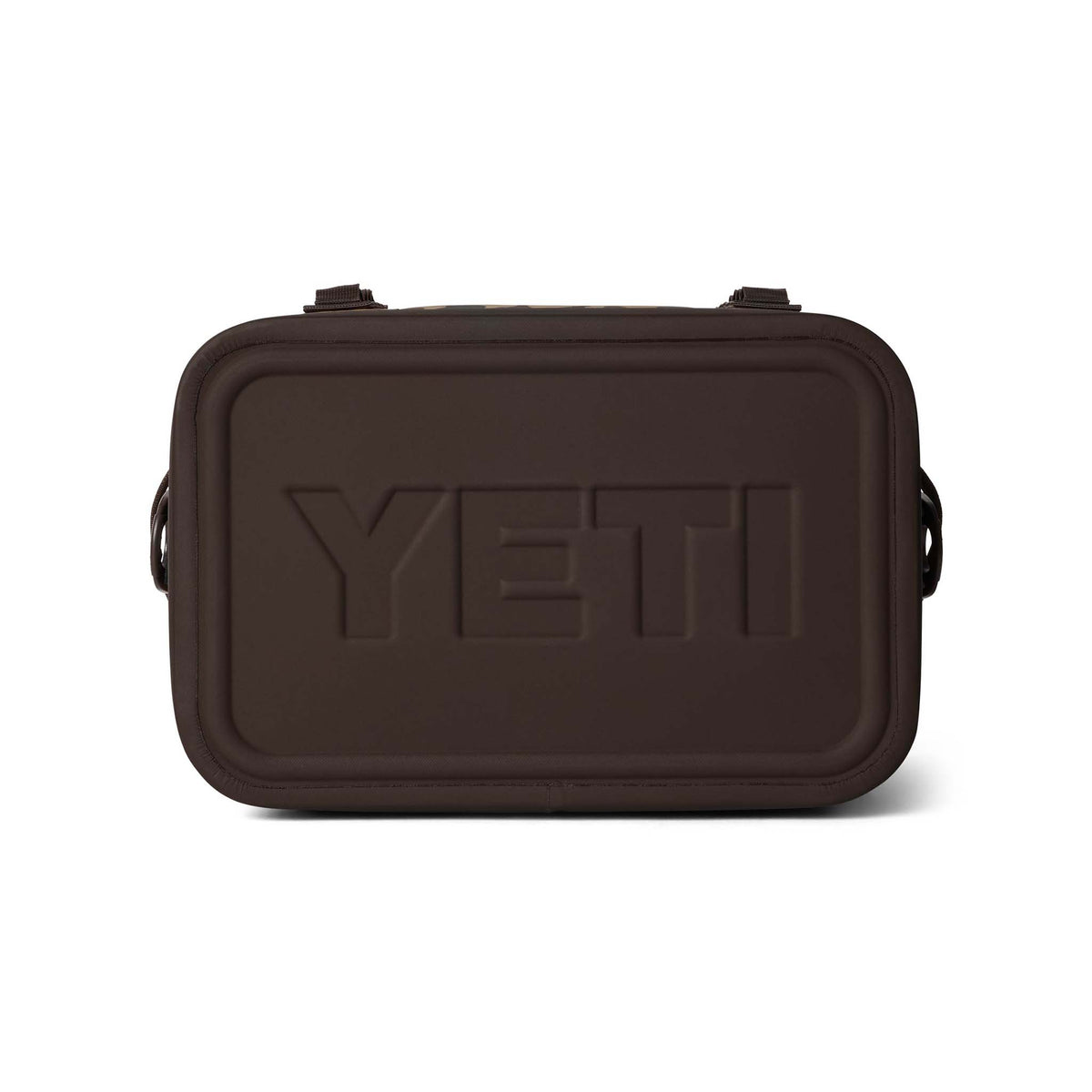 Bottom view of the closed YETI Hopper Flip 18 cooler in Wetlands Camo, showing dark brown molded lid with embossed YETI logo.