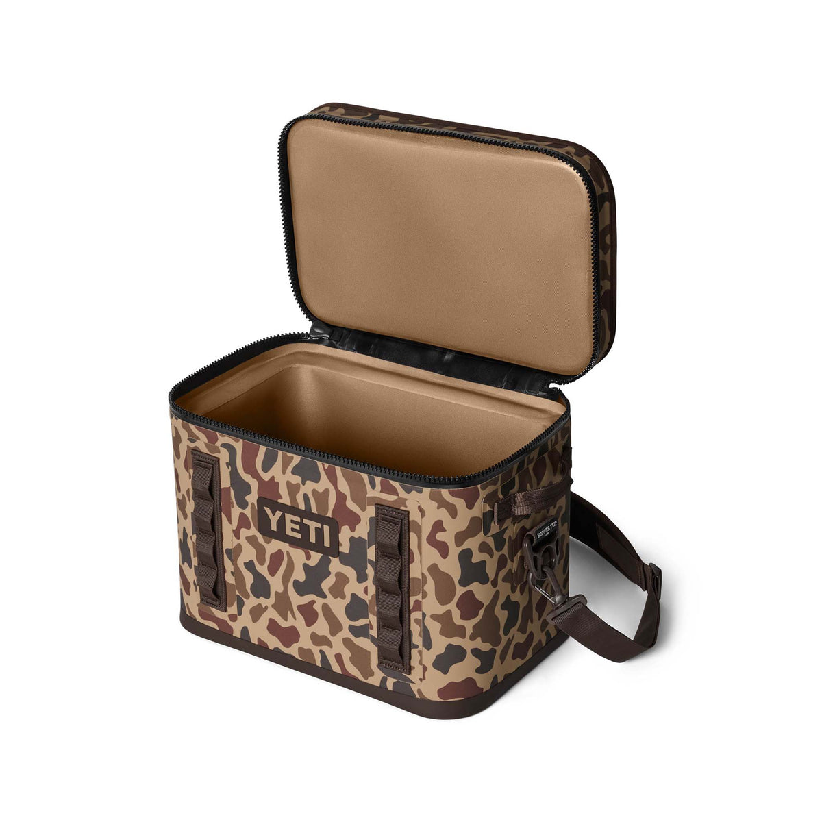 YETI Hopper Flip 18 in Wetlands Camo shown open from a front angle, revealing tan insulated interior.