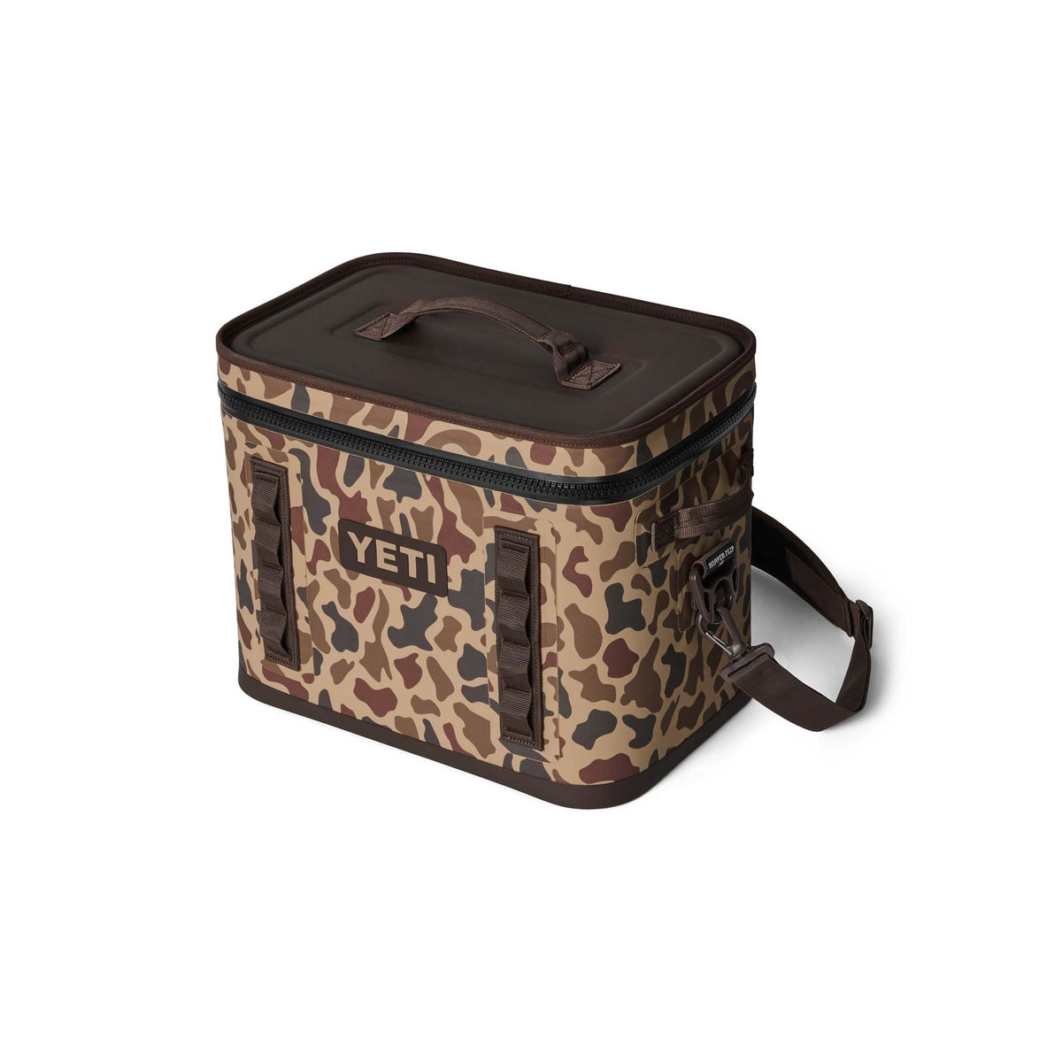 YETI Hopper Flip 18 soft cooler in Wetlands Camo shown at a front angle with the lid closed and side strap visible.