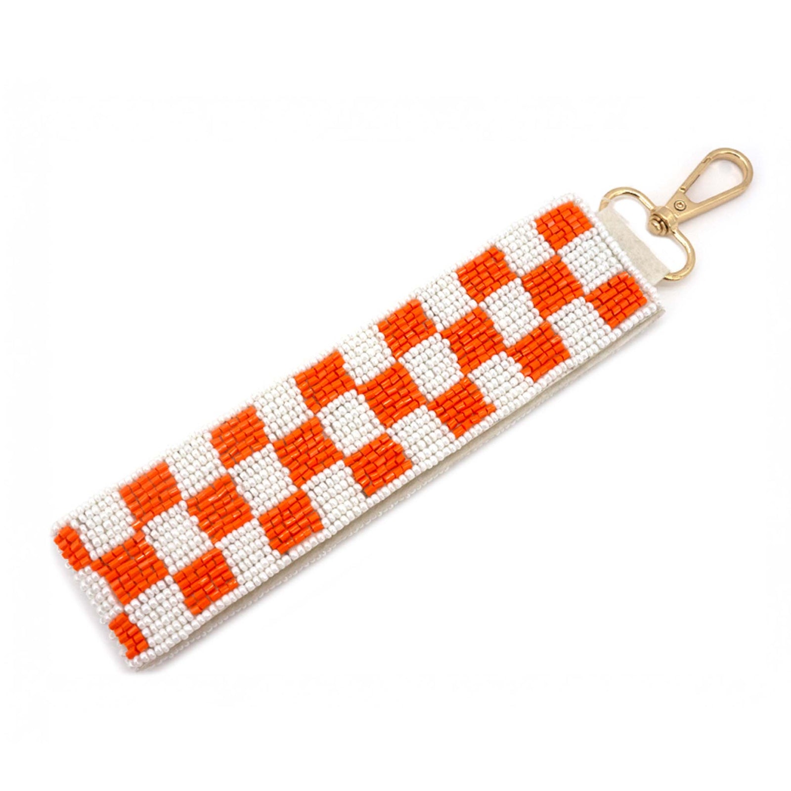 Beaded key fob with orange and white checkerboard pattern and gold metal clasp attachment.