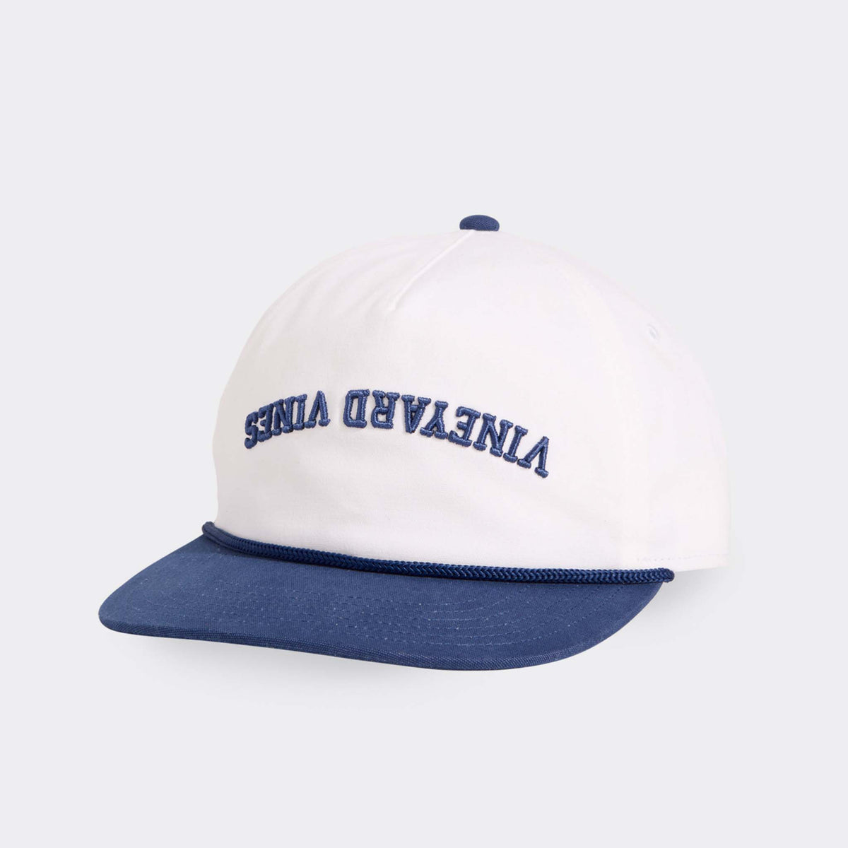 White and blue cap with 'Vineyard Vines' branding on a white background