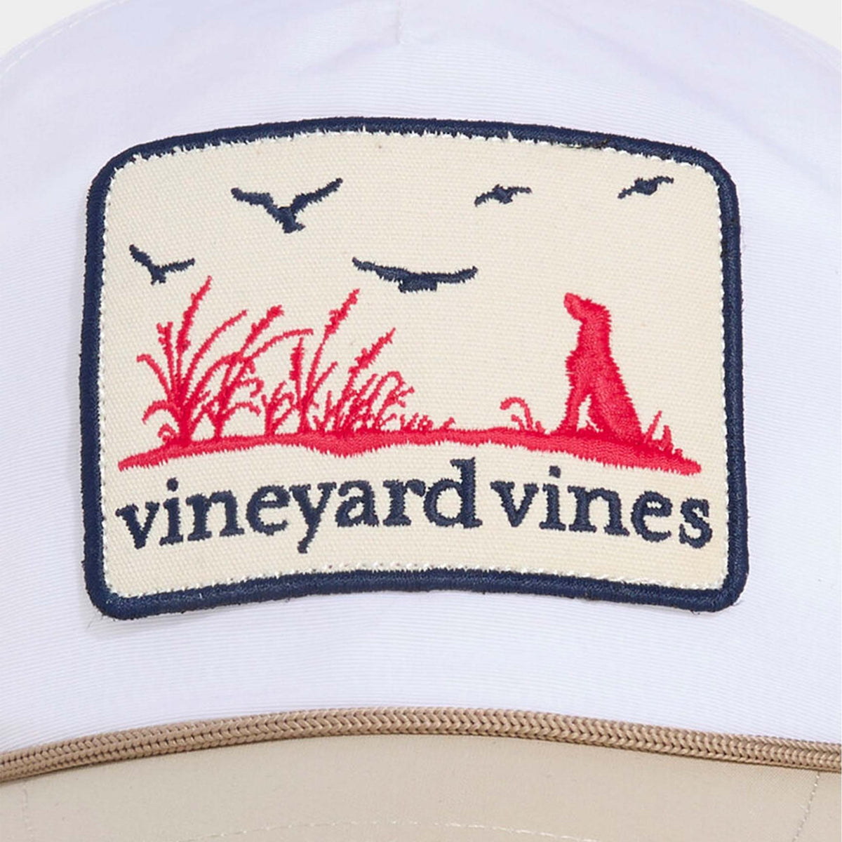 Vineyard Vines Dog Patch Hat featuring embroidered red dog, marsh grass, and flying birds with navy logo text on front panel.