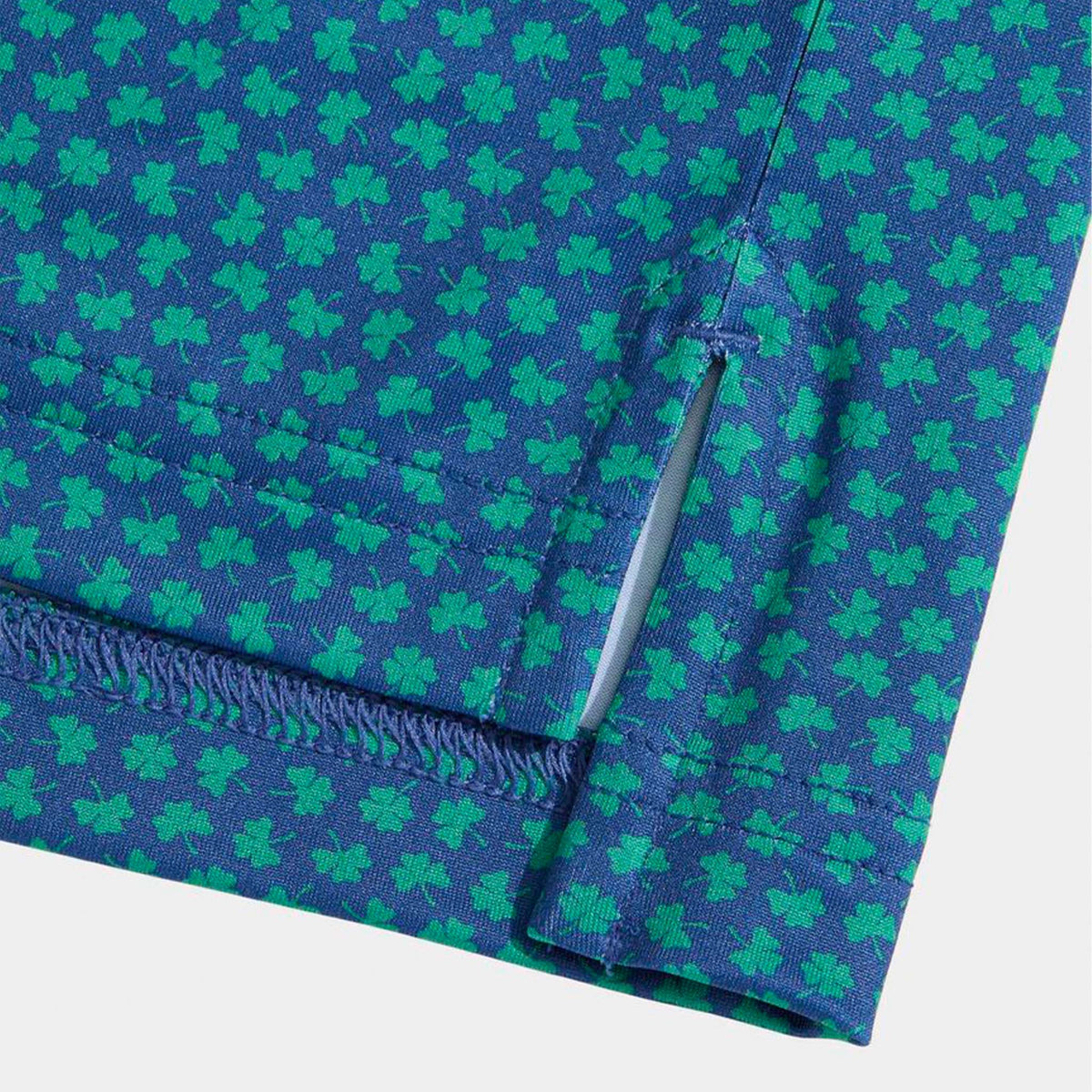 Vineyard Vines On-The-Go Sankaty Polo in Micro Clover Moonshine sleeve detail with hidden side zipper pocket and patterned performance fabric.