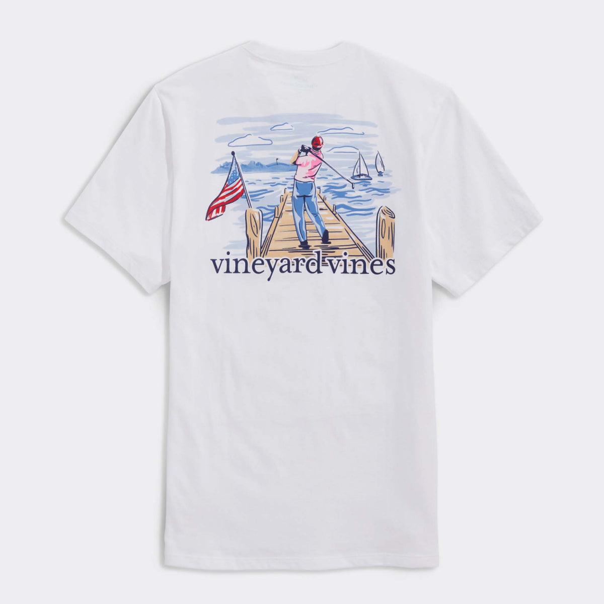 White t-shirt with a graphic of a person fishing on a dock and an American flag, branded 'Vineyard Vines'.