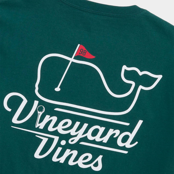 Green t-shirt with whale logo and 'Vineyard Vines' text on a white background