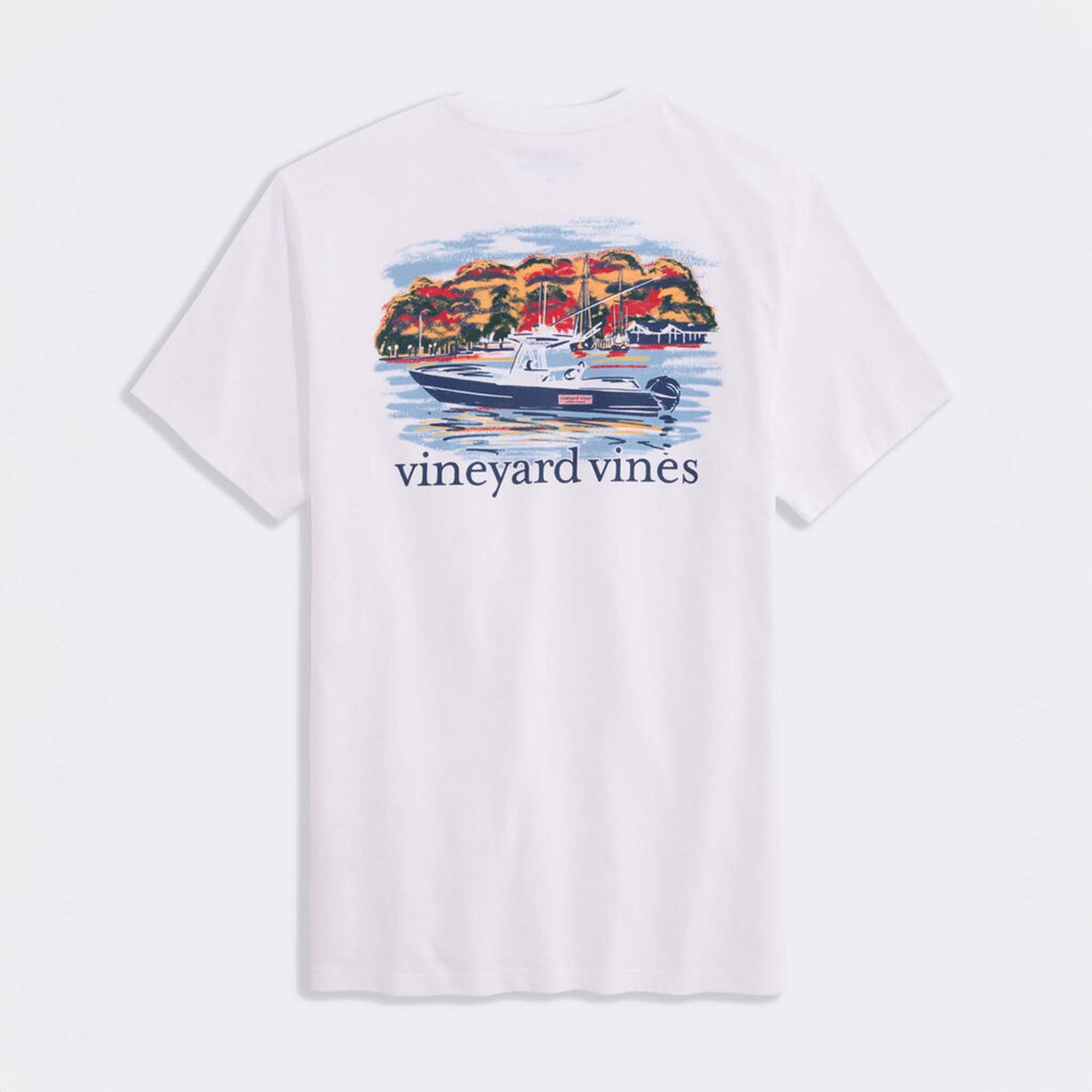 Back view of white Vineyard Vines t-shirt with large boating scene graphic of a navy vessel on the water and colorful trees in the background.