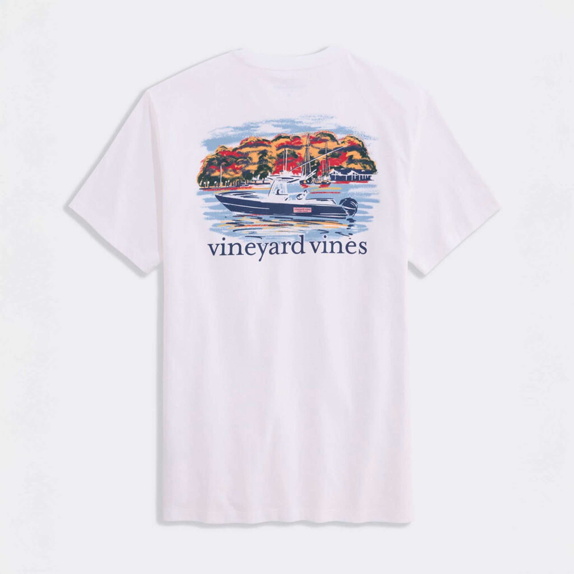 Back view of white Vineyard Vines t-shirt with large boating scene graphic of a navy vessel on the water and colorful trees in the background.