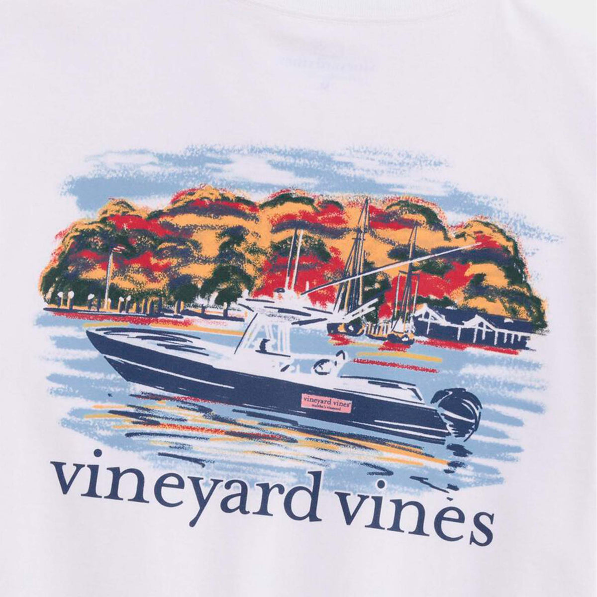 Close-up of back graphic showing detailed illustration of a boat on water with autumn trees behind and Vineyard Vines logo below.