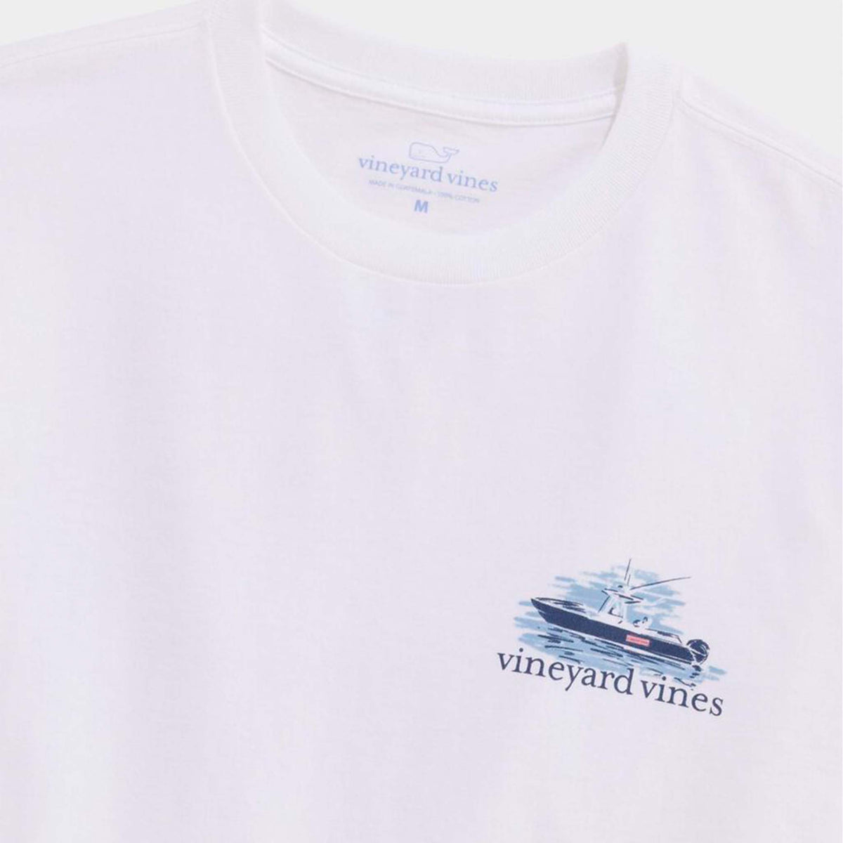 Close-up of pocket graphic featuring navy boat illustration with Vineyard Vines logo.