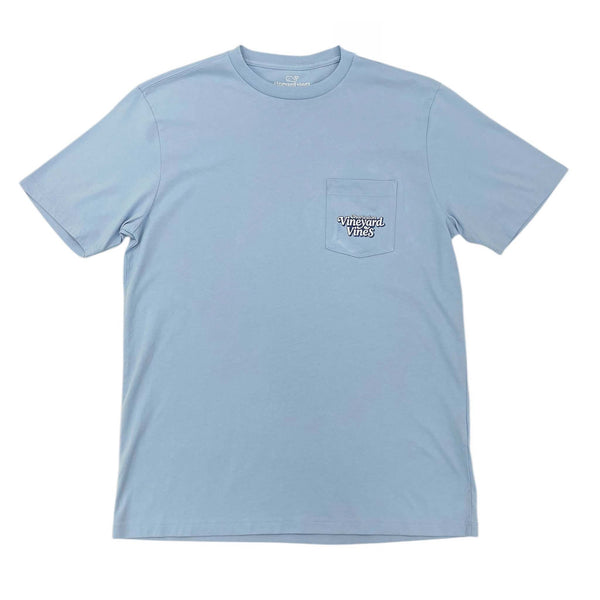 Vineyard Vines Charleston Bridge Short Sleeve T-shirt, color light blue, sizes S-XXL, 100% cotton.  Front of a light blue Vineyard Vines short sleeve t-shirt with a left chest pocket featuring 'Vineyard Vines' and 'Charleston' are in a retro-style font on the pocket.