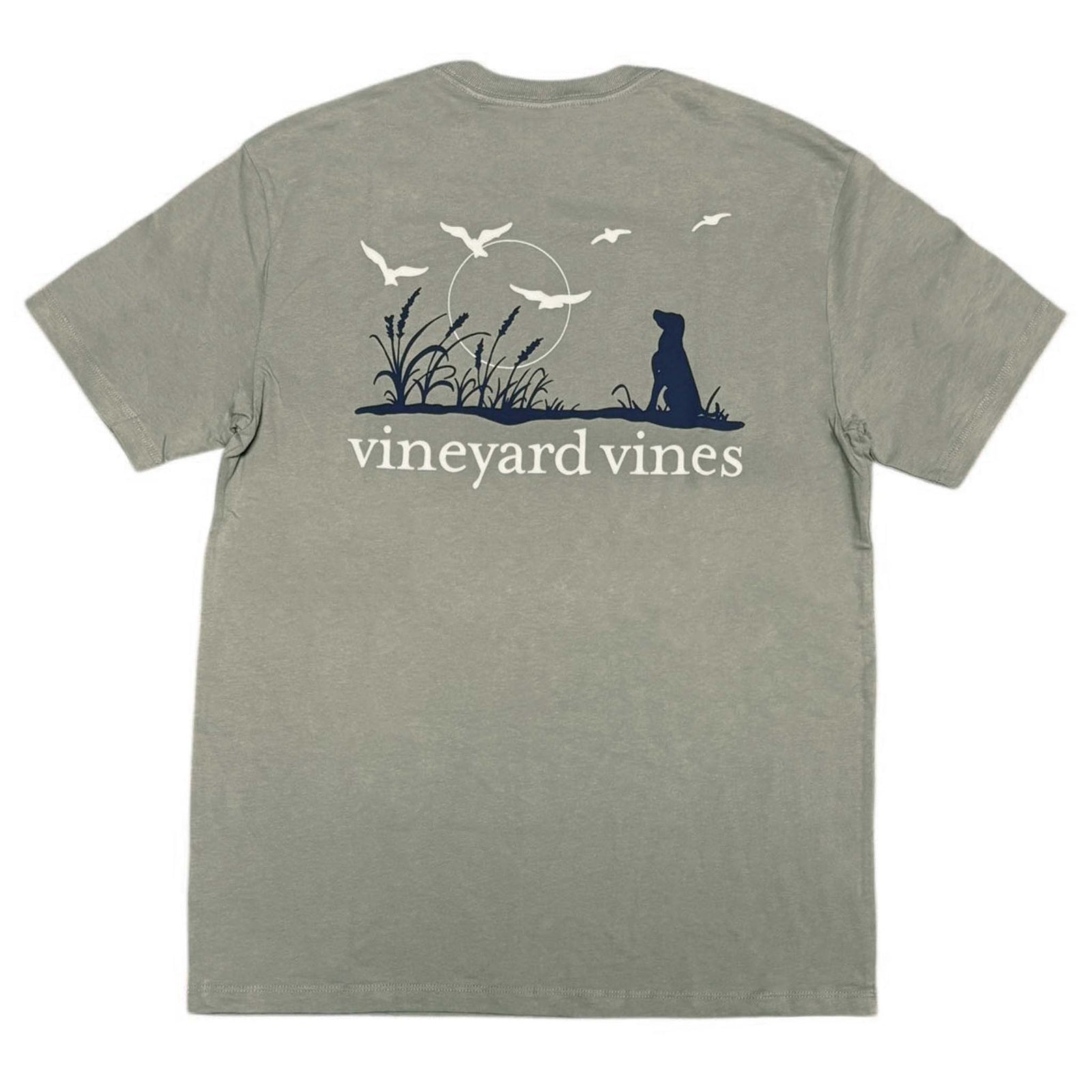 Vineyard Vines Dune Grass T-shirt in gray with graphic of dog silhouette, dune grass, seagulls, and sun with logo text on back.