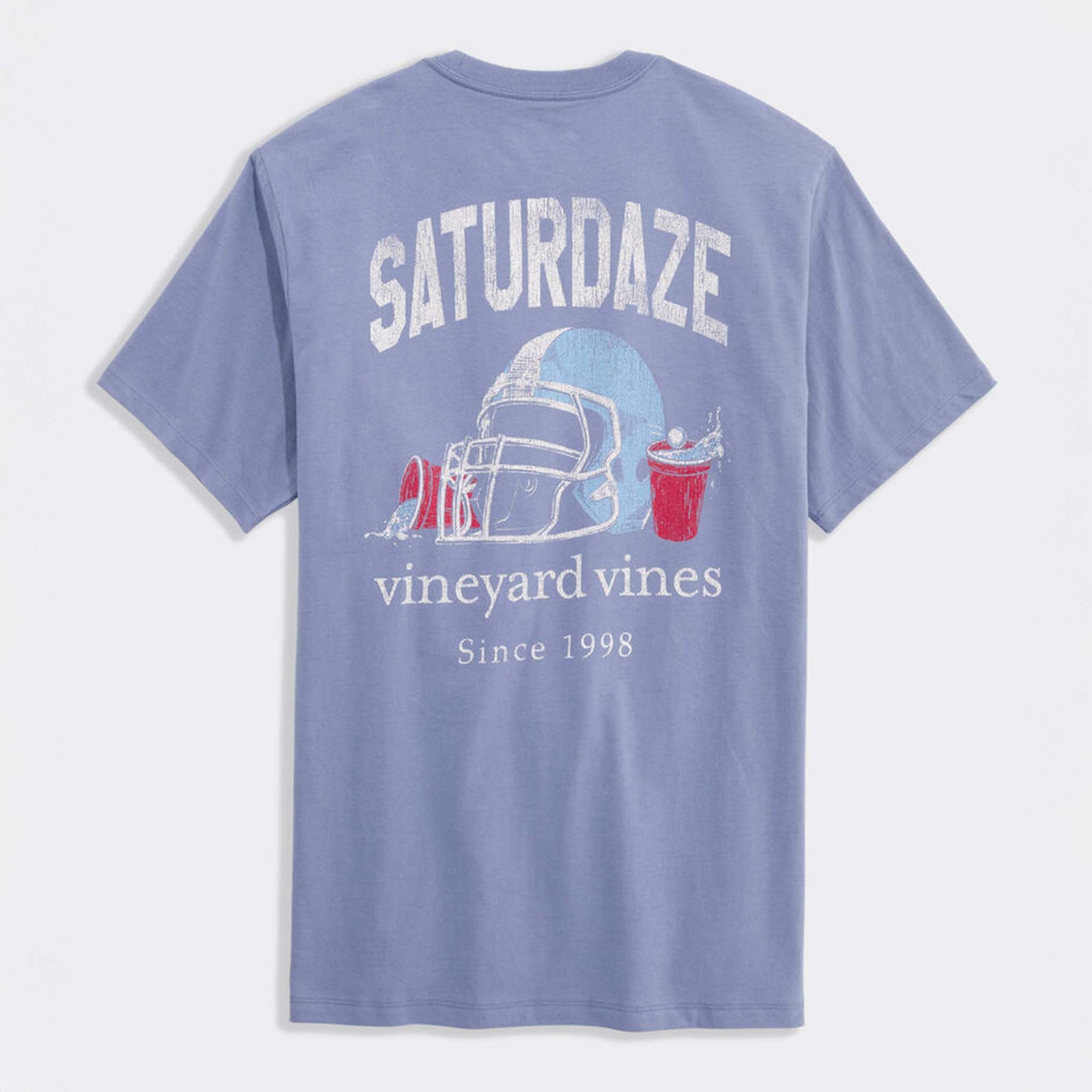 Blue t-shirt with 'Saturdaze' graphic and 'vineyard vines' branding on a light gray background