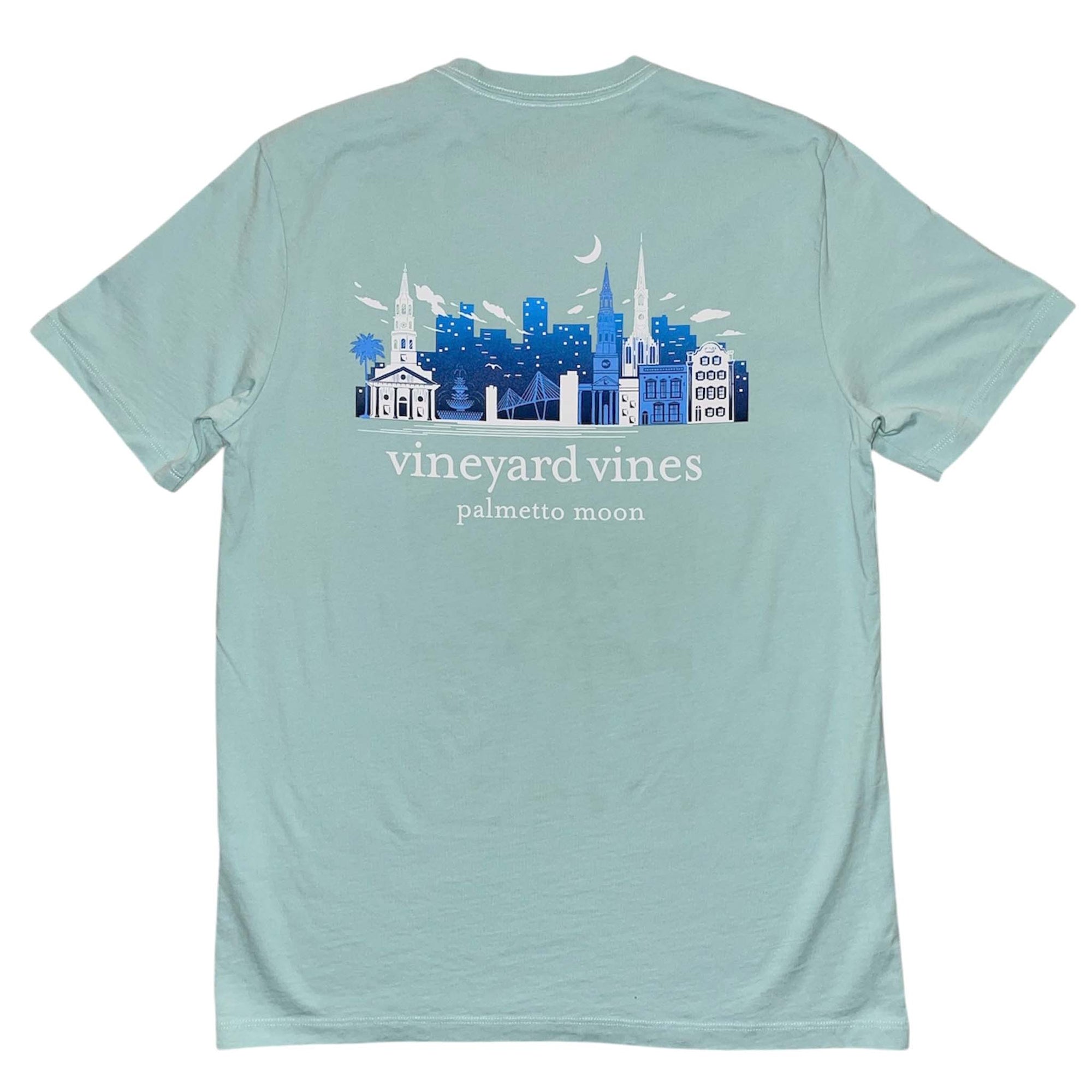 Back of aqua haze Vineyard Vines t-shirt with blue Charleston cityscape graphic and "vineyard vines palmetto moon" text.
