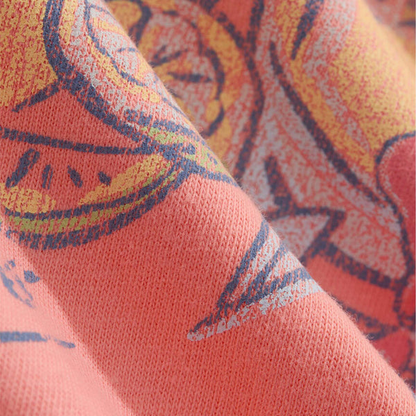 Close up of graphic on Vineyard vines coral t-shirt
