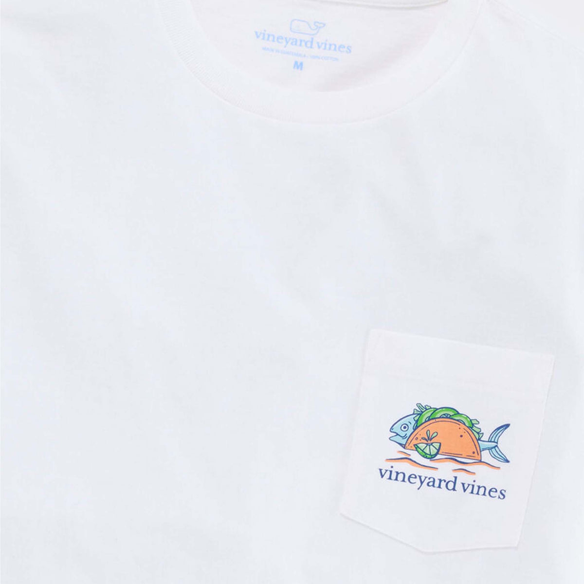 White t-shirt with Vineyard Vines logo and fish design on a white background
