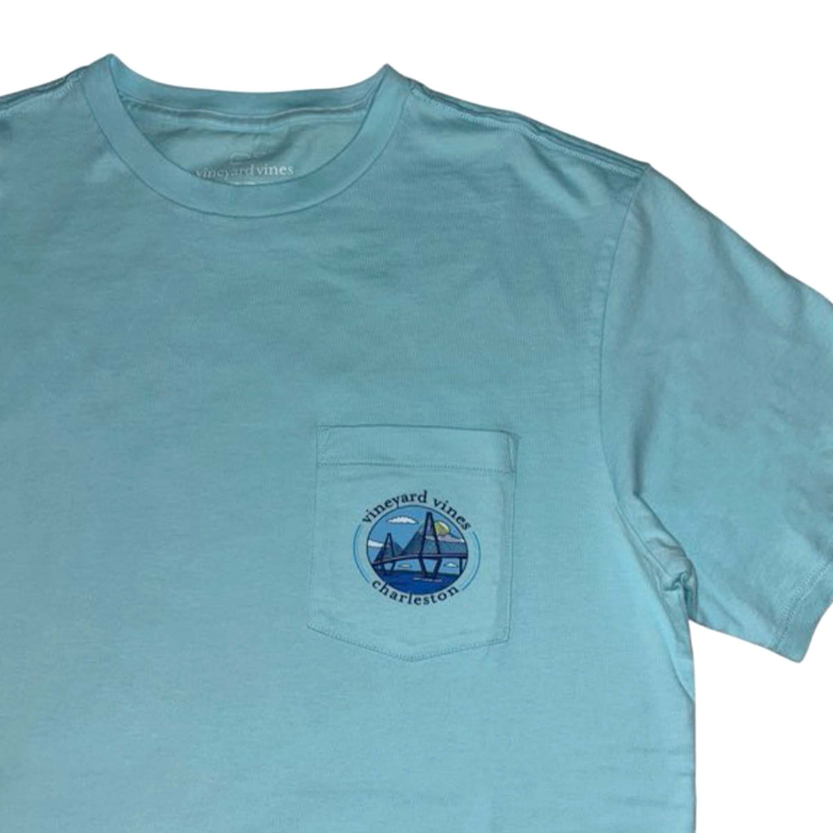 Vineyard Vines Charleston Aqua Splash t-shirt with front pocket featuring Ravenel Bridge circular graphic.
