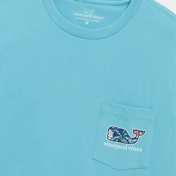 Vineyard Vines Short Sleeve Pocket T-Shirt in Turquoise close-up of neckline and chest pocket with tropical whale illustration and vineyard vines logo.