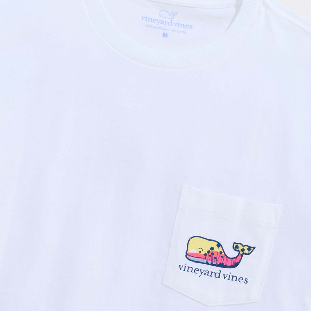 Vineyard Vines Short Sleeve Pocket T-Shirt in White Cap close-up of front chest pocket with sunset whale illustration and vineyard vines logo.