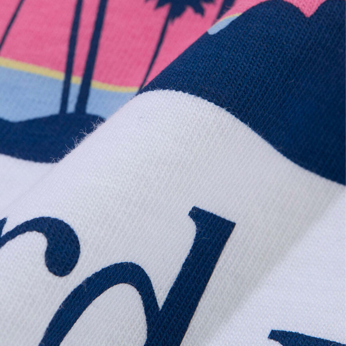 Vineyard Vines Short Sleeve Pocket T-Shirt in White Cap fabric close-up showing printed whale graphic texture and navy outline detail.