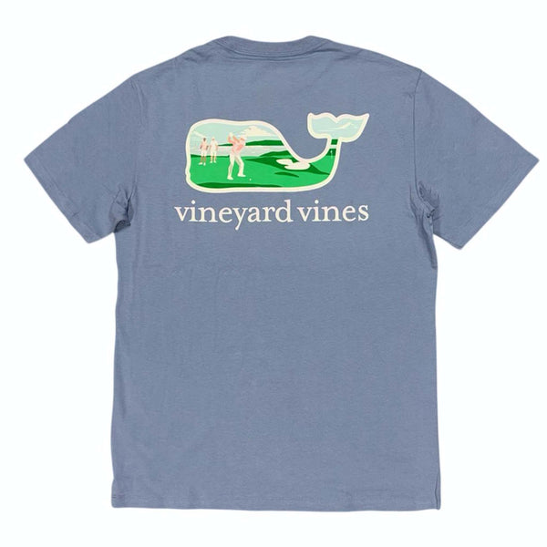 Blue t-shirt with a graphic of a whale and people playing golf, featuring the 'Vineyard Vines' logo.