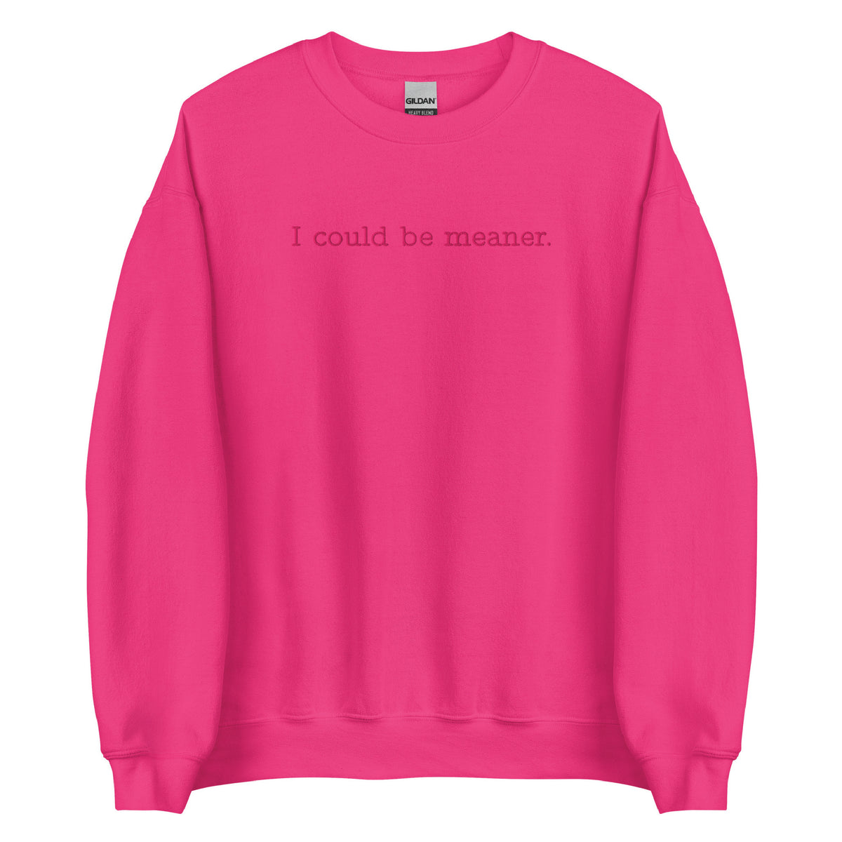 Pink sweatshirt with text 'I could be meaner' on a white background