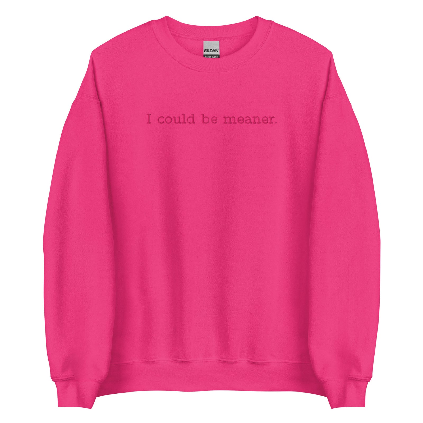 Pink sweatshirt with text 'I could be meaner' on a white background