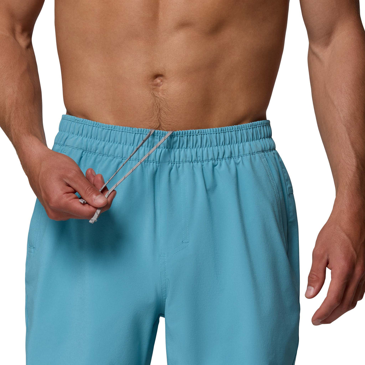 front close up waistband view of Columbia PFG Terminal Roamer™ 6 Inch Stretch Shorts in Caribbean blue