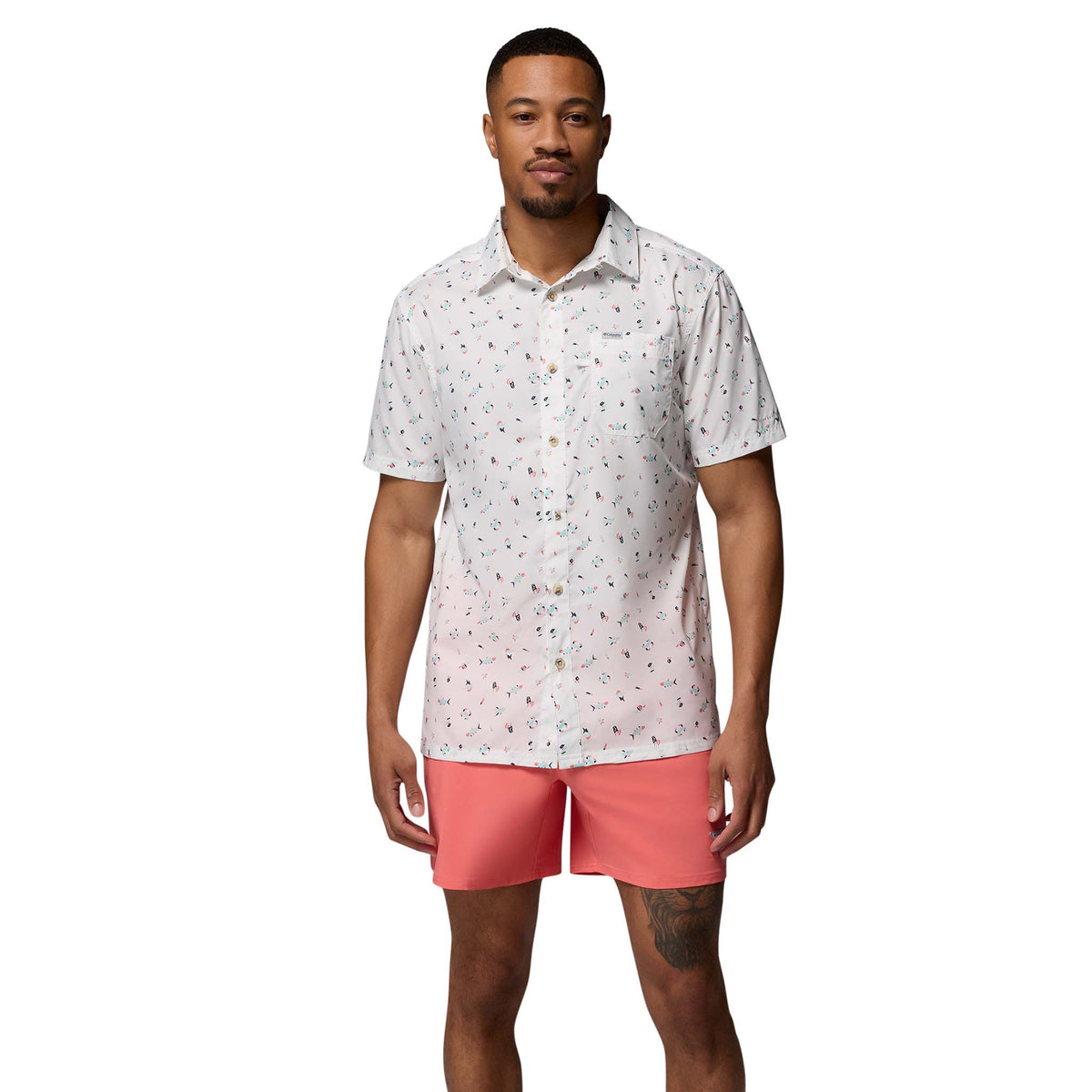 man in studio wearing Columbia PFG Terminal Roamer™ 6 Inch Stretch Shorts in melonade 