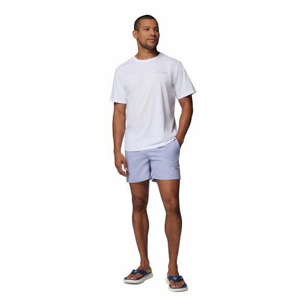  Man wearing a white t-shirt and light purple shorts on a white background