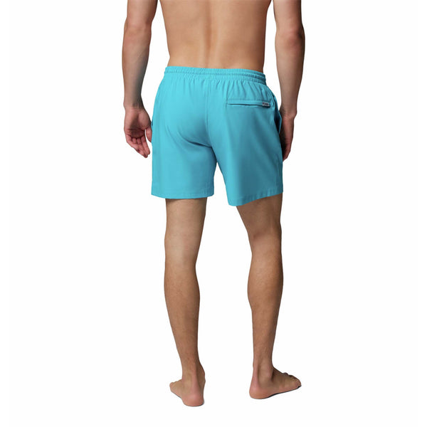  Person wearing turquoise shorts on a white background