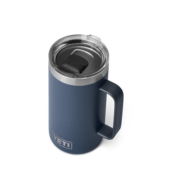  "Navy 24-ounce YETI Rambler Mug with a sturdy stainless steel body, wide handle for easy grip, and a clear MagSlider lid; features double-wall vacuum insulation to maintain drink temperature and the YETI logo etched on the front.