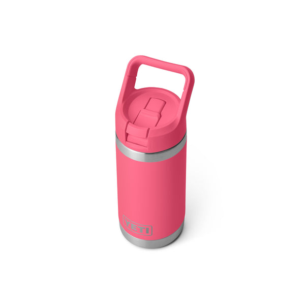 Tropical Pink 12-ounce YETI Rambler Jr. Kids Bottle made from durable stainless steel, featuring double-wall vacuum insulation, a leak-resistant straw cap, and a sturdy carrying handle; includes the YETI logo on the front and a wide-mouth opening for easy cleaning.