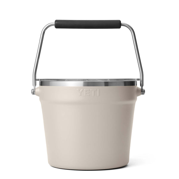 Beige YETI bucket with a black handle on a white background