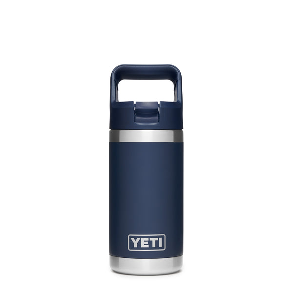 Navy 12-ounce YETI Rambler Jr. Kids Bottle crafted from durable stainless steel with double-wall vacuum insulation, a leak-resistant straw cap, and a convenient carrying handle; features the YETI logo on the front and a wide-mouth opening for easy cleaning.