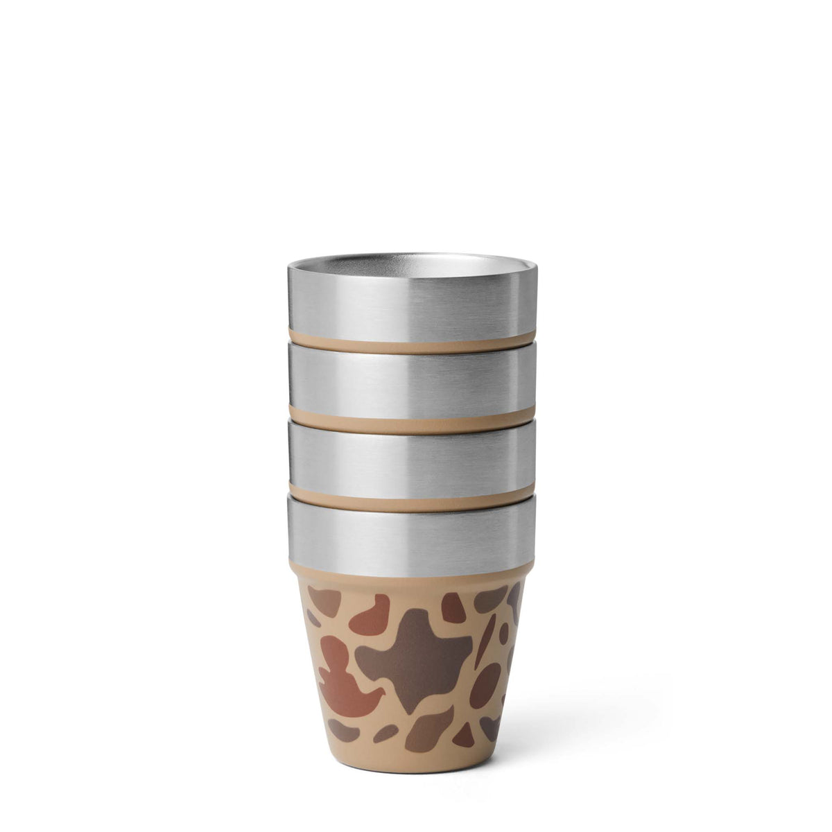 Side view of four stacked YETI 1 oz Shot Cups in Wetlands Camo with exposed stainless rims.