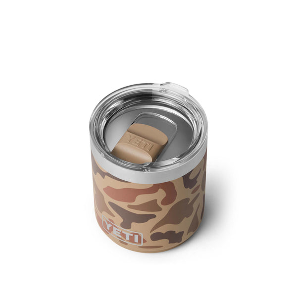 Angled view of YETI 10 oz Mug in Wetlands Camo with clear lid and tan MagSlider closed over the drinking opening.