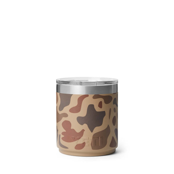 YETI 10 oz Stackable Mug in Wetlands Camo shown from alternate angle with embossed YETI logo near base and soft brown camo tones.