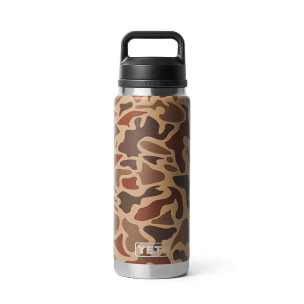 YETI 26 oz Chug Bottle in Wetlands Camo standing upright with handle cap closed.