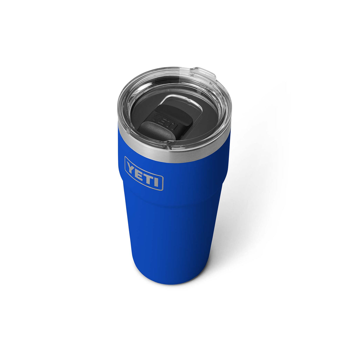 Blue YETI tumbler with a clear lid on a white background