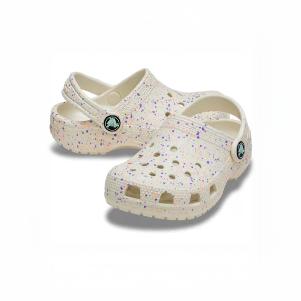 Pair of speckled clogs on a white background