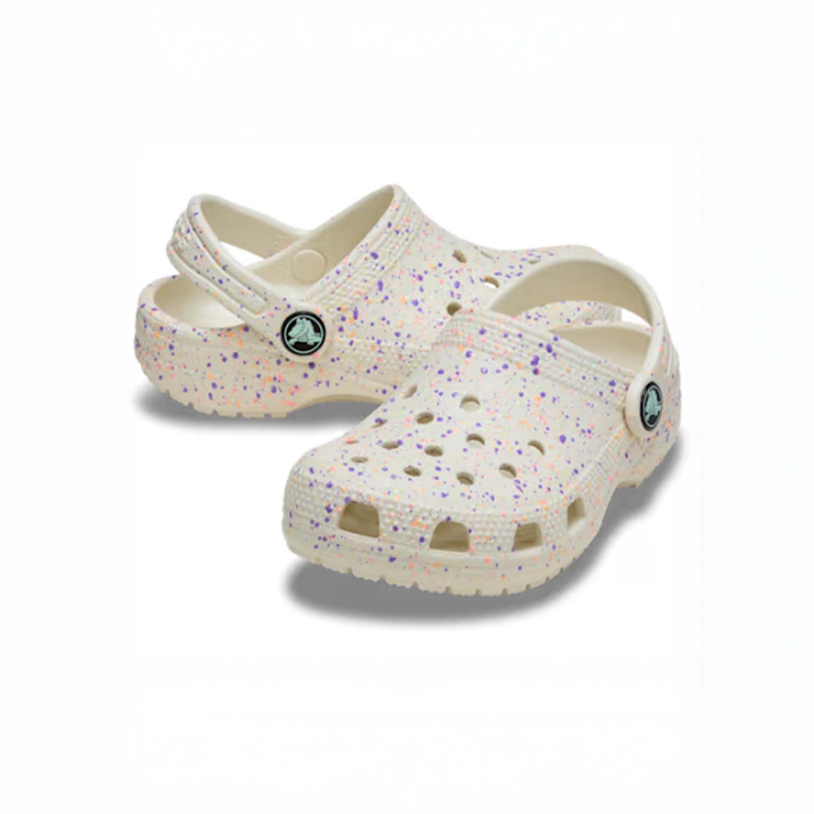 Pair of speckled clogs on a white background