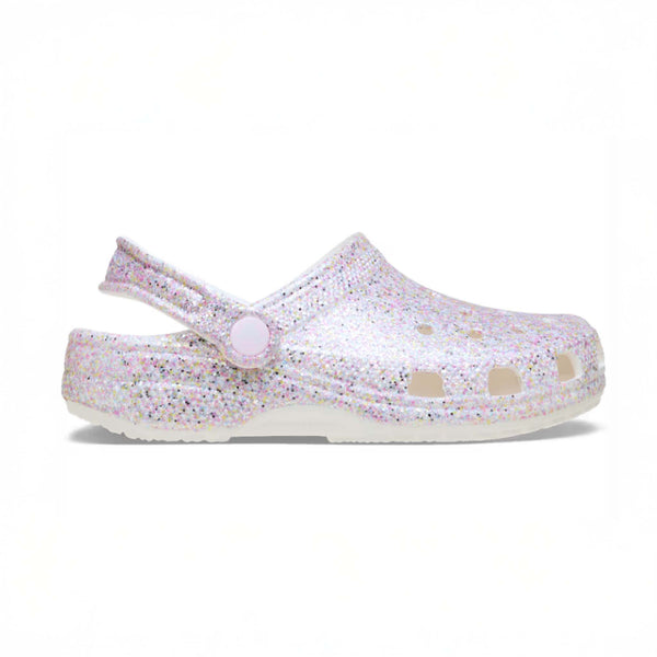 Single glittery clog shoe on a white background