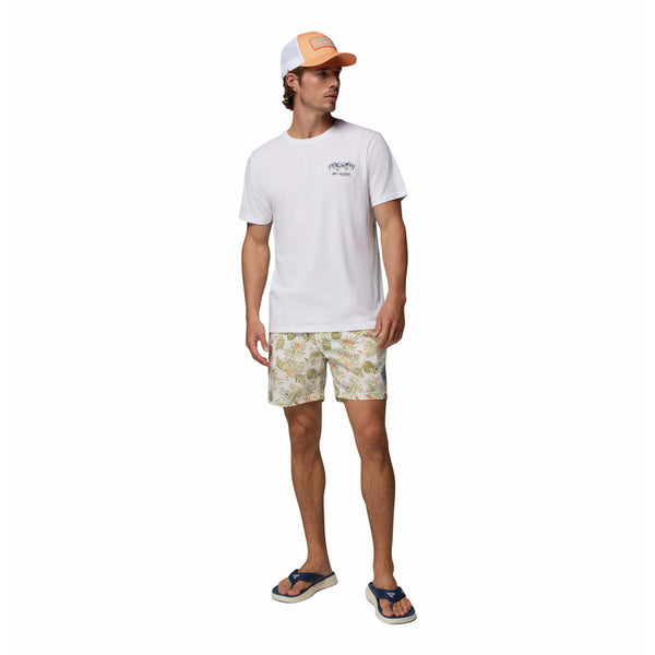  Man wearing a white t-shirt, patterned shorts, and a cap on a white background