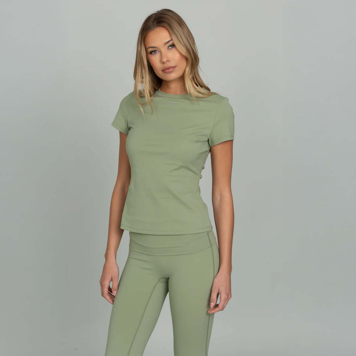 Light green fitted short sleeve tee with GH logo, angled front view.