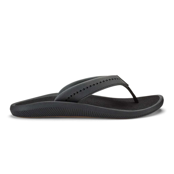 Single Olukai Women's Ulele Sandal in Black shown on a white background.