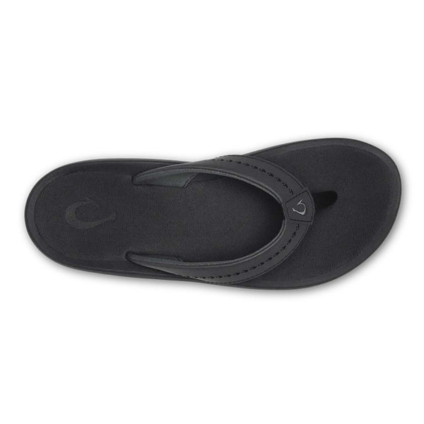 Single Olukai Women's Ulele Sandal in Black shown on a white background.